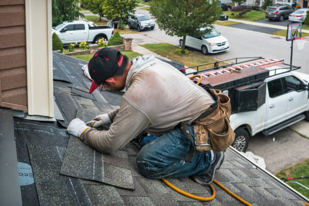 Professional Roofing technician working in West Des Moines, IA